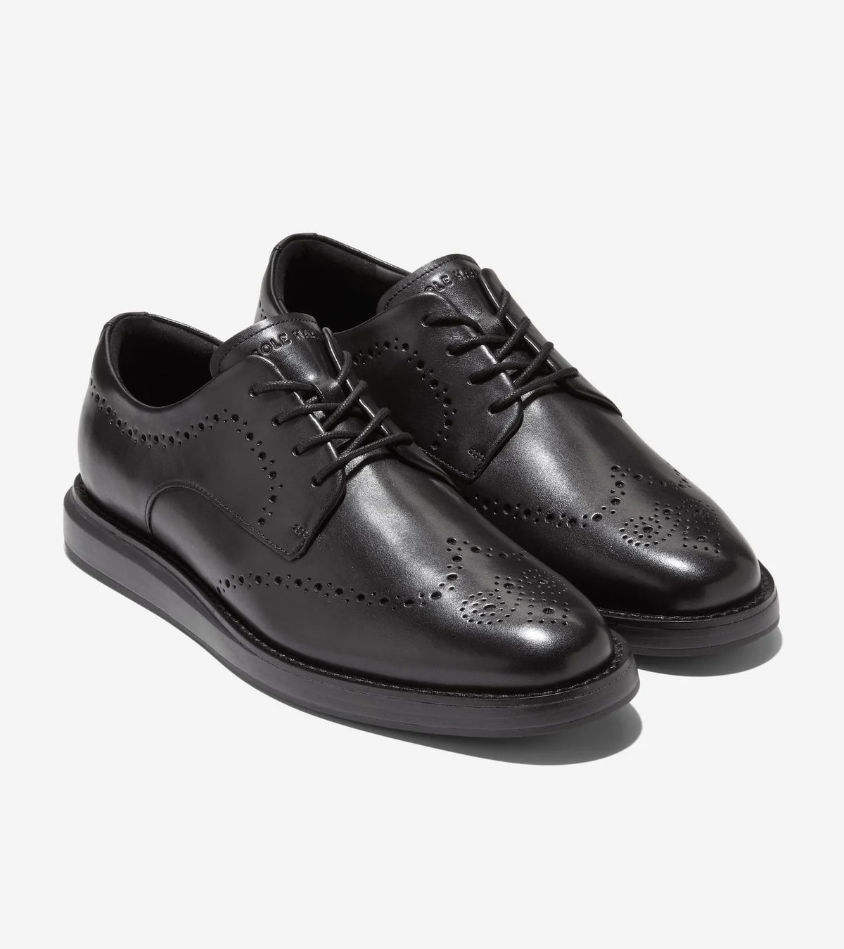 Oxford Cole Haan Grand Neoclassic FlexCraft Wingtip negro, vista lateral frontal